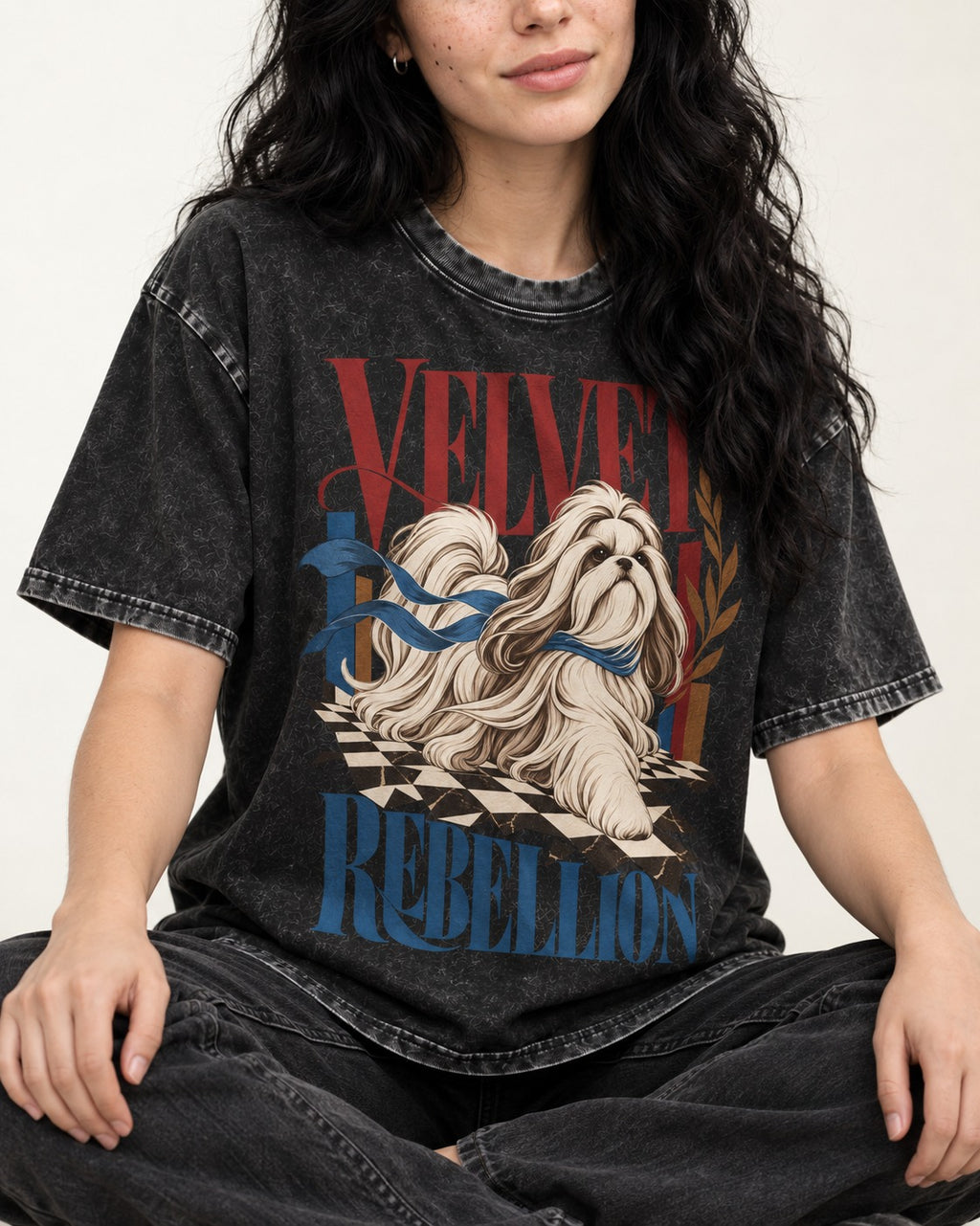 Shih Tzu Velvet Rebellion Checkerboard Graphic Washed Tee in Black, worn by a seated model