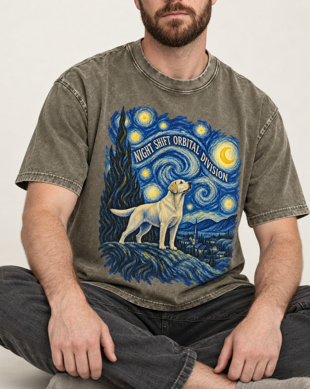 Labrador Retriever Night Shift Orbital Division Starry Night Graphic Washed Tee in Army Green, worn by a seated model