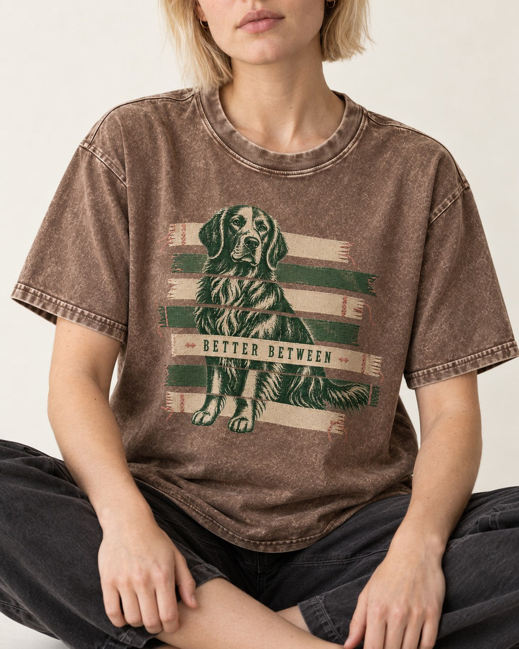 Golden Retriever Better Between Washed Tee in Coffee, worn by a seated model
