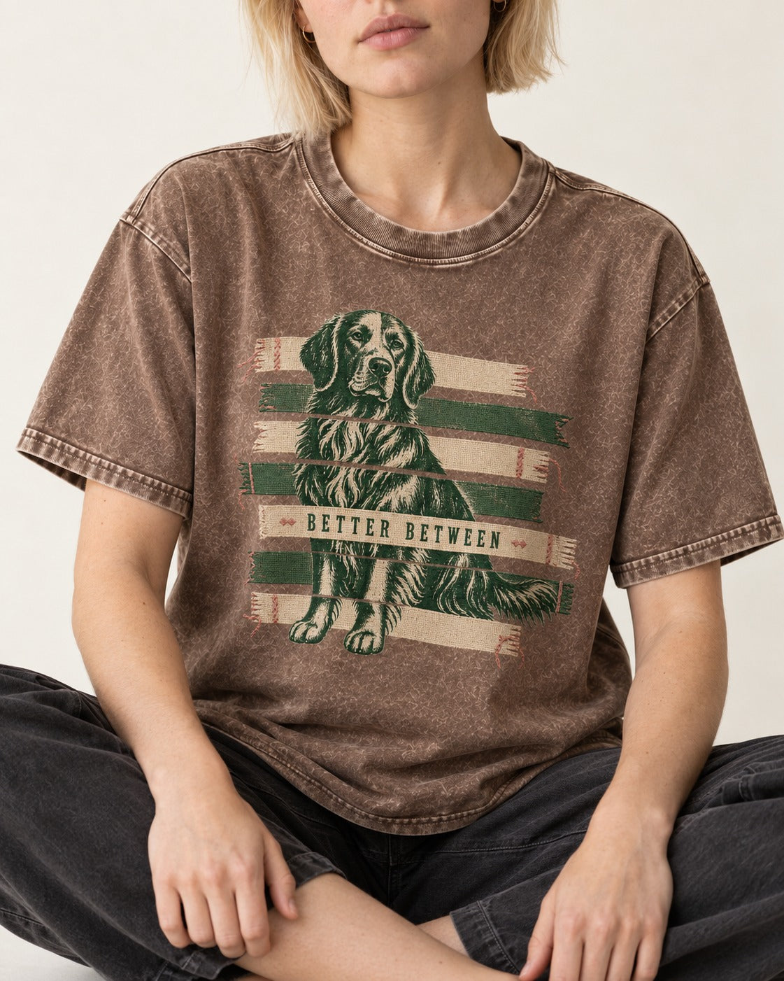 Golden Retriever Better Between Washed Tee in Coffee, worn by a seated model