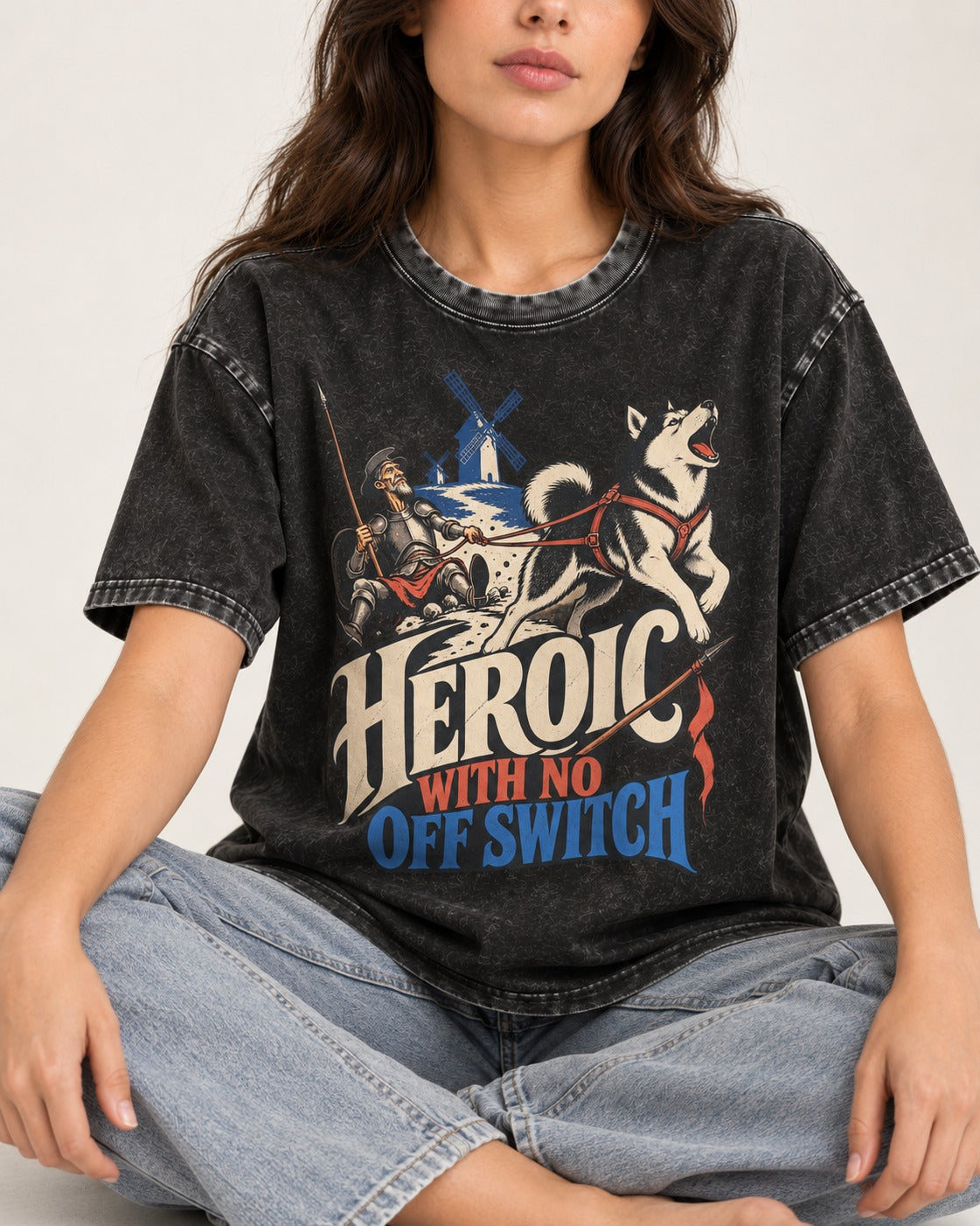 Husky Heroic with No Off Switch Don Quixote Graphic Washed Tee in Black, worn by a seated model