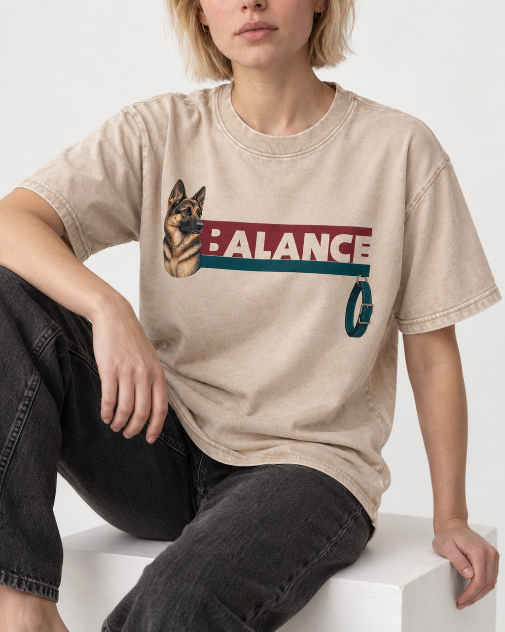 German Shepherd Dog Balance Washed Tee in Apricot, worn by a seated model