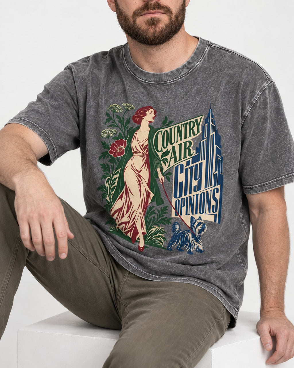 Yorkshire Terrier Country Air City Opinions Botanical Graphic Washed Tee in Gray, worn by a seated model