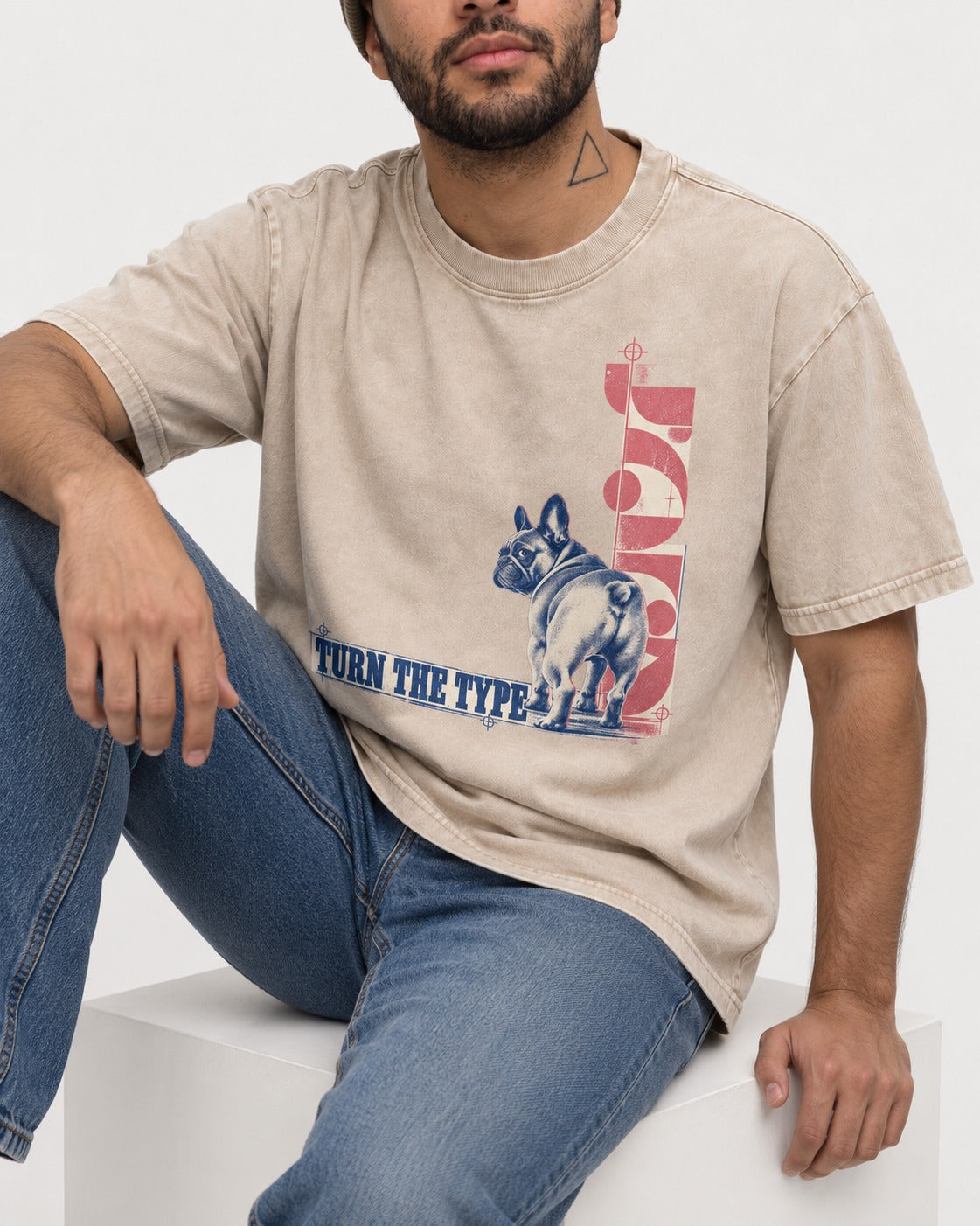 Frenchie Turn the Type Washed Tee in Apricot, worn by a seated model