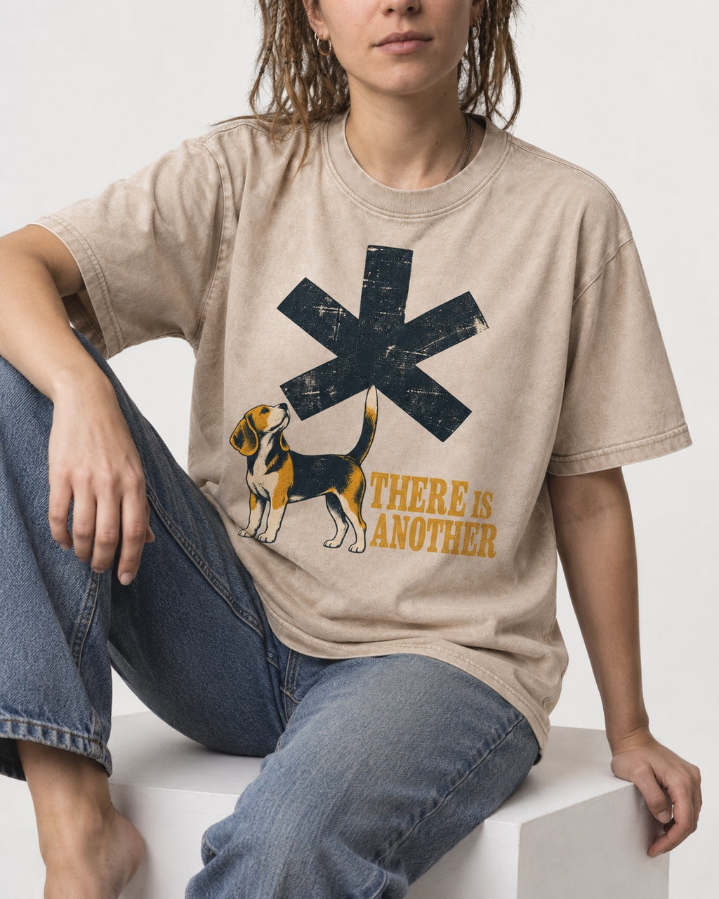 There Is Another Beagle Washed Tee in Apricot, worn by a seated model