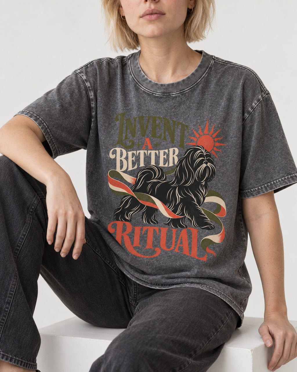 Shih Tzu Invent A Better Ritual Sunrise Ribbon Graphic Washed Tee in Gray, worn by a seated model