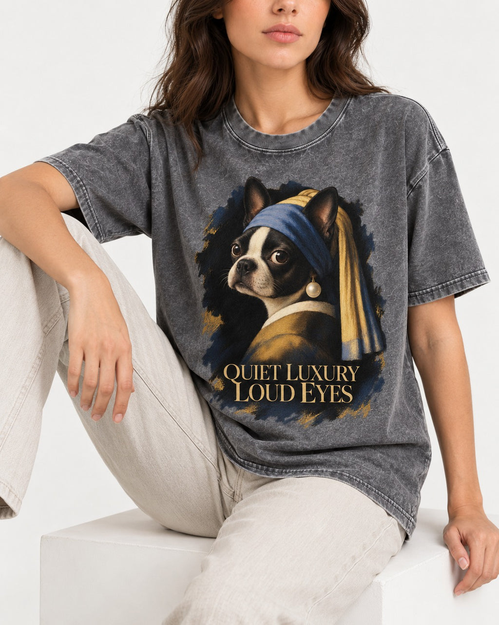 Quiet Luxury Loud Eyes Boston Terrier Pearl Portrait Washed Tee in Gray, worn by a seated model