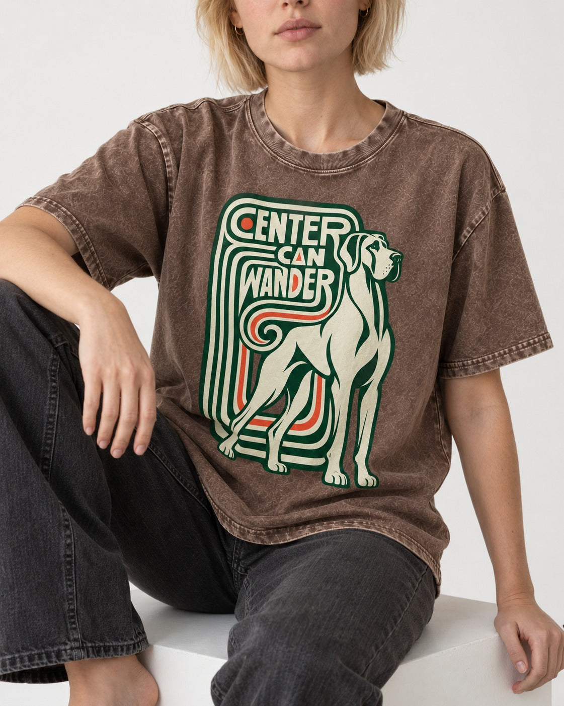 Great Dane Center Can Wander Washed Tee in Coffee, worn by a seated model