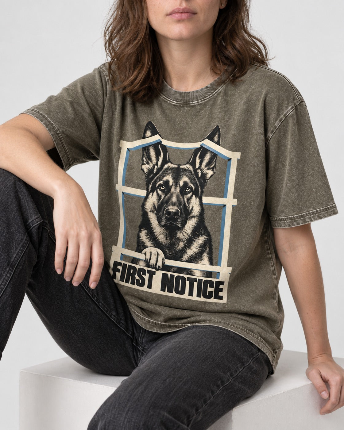 First Notice Window German Shepherd Dog Graphic Washed Tee in Army Green, worn by a seated model