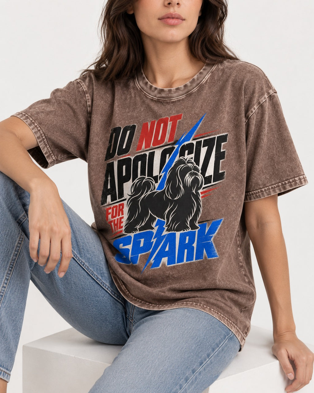 Never Apologize for Shih Tzu Spark Washed Tee in Coffee, worn by a seated model