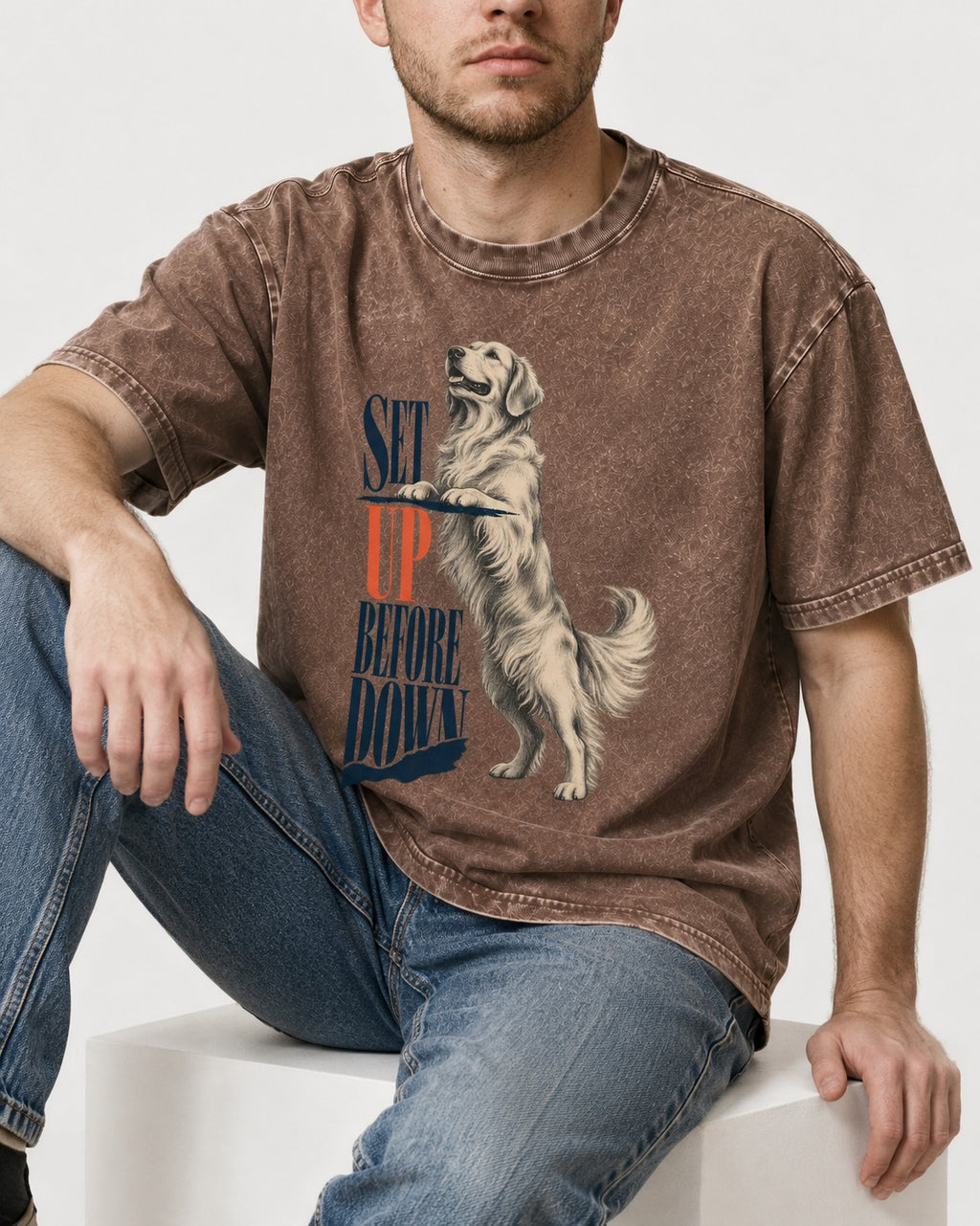 Golden Retriever Set Up Before Down Washed Tee in Coffee, worn by a seated model