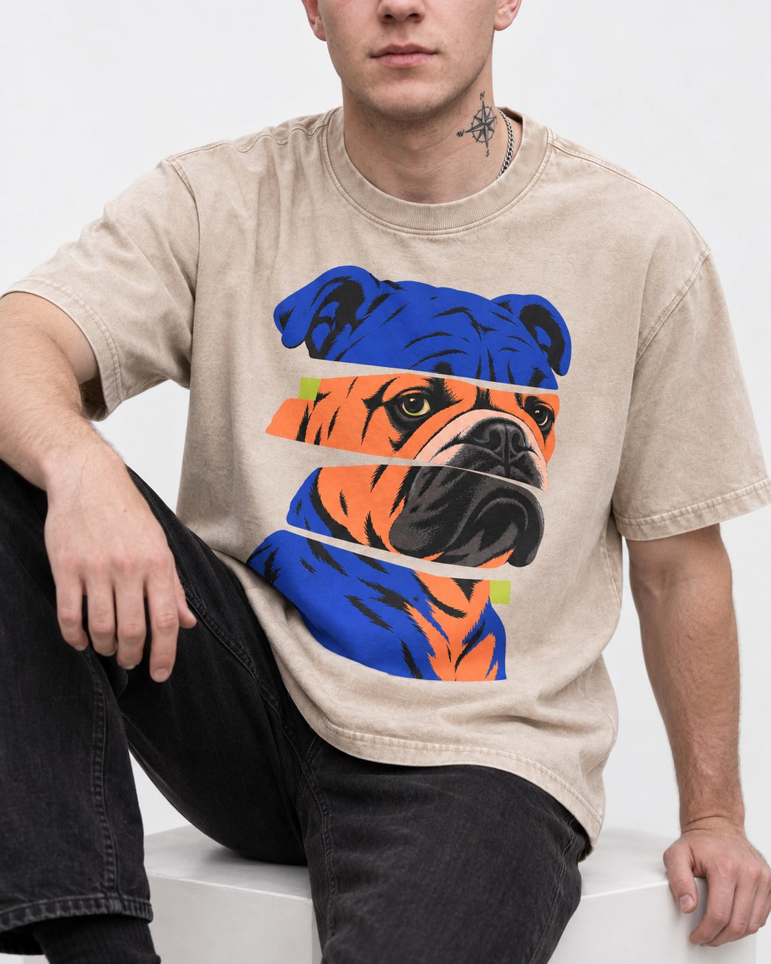 English Bulldog Unbreakable Washed Tee in Apricot, worn by a seated model