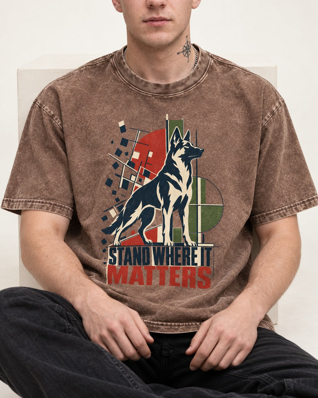 Stand Where It Matters German Shepherd Dog Washed Tee in Coffee, worn by a seated model