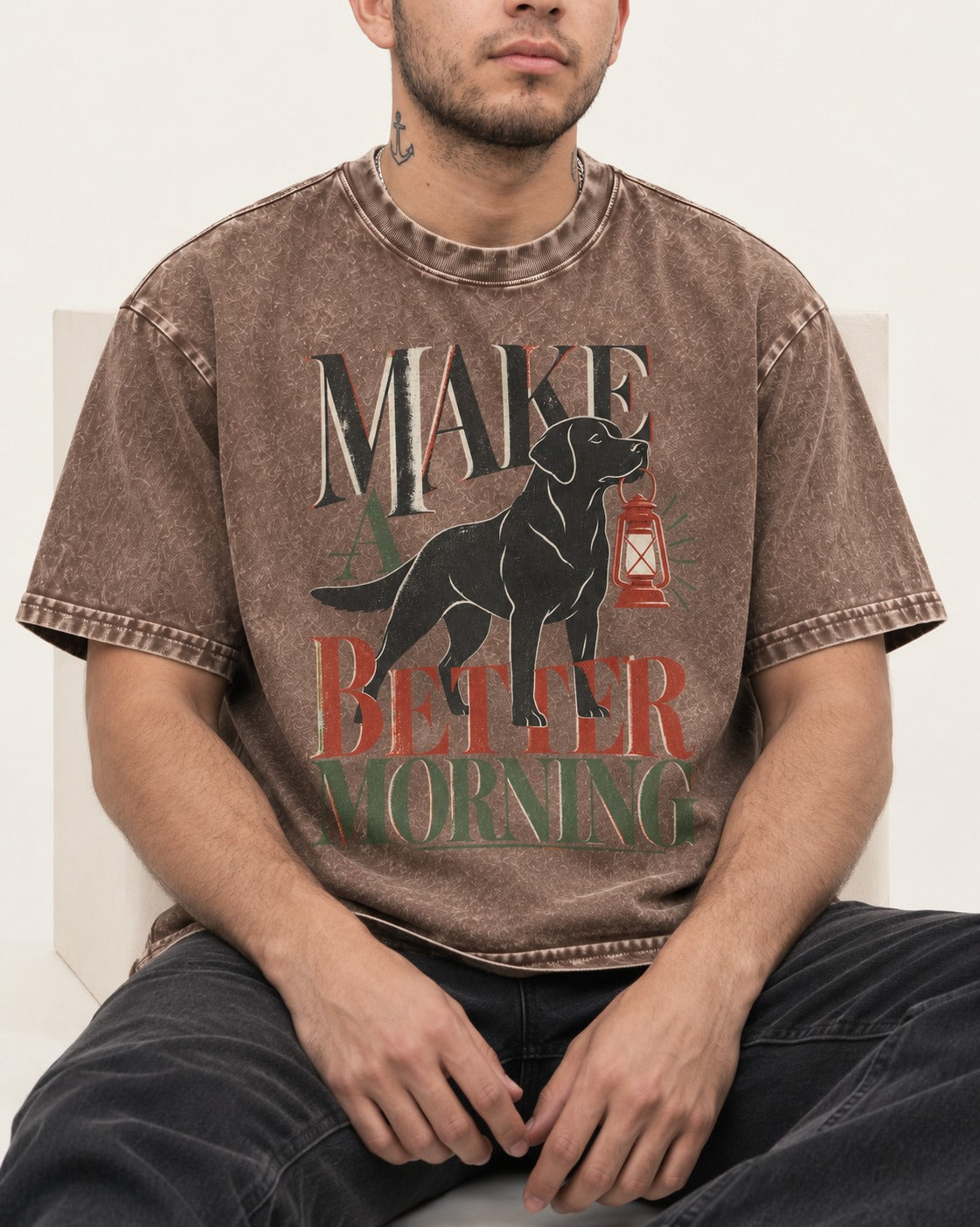 Make a Better Morning Labrador Retriever Washed Tee in Coffee, worn by a seated model