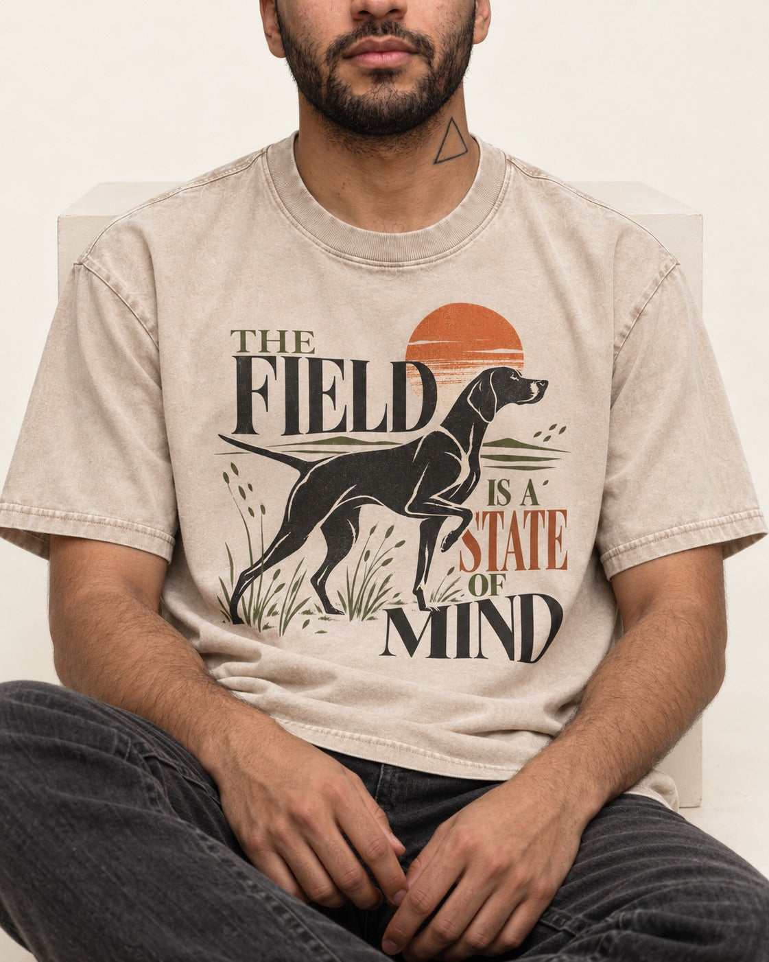 German Shorthaired Pointer Field State of Mind Washed Tee in Apricot, worn by a seated model