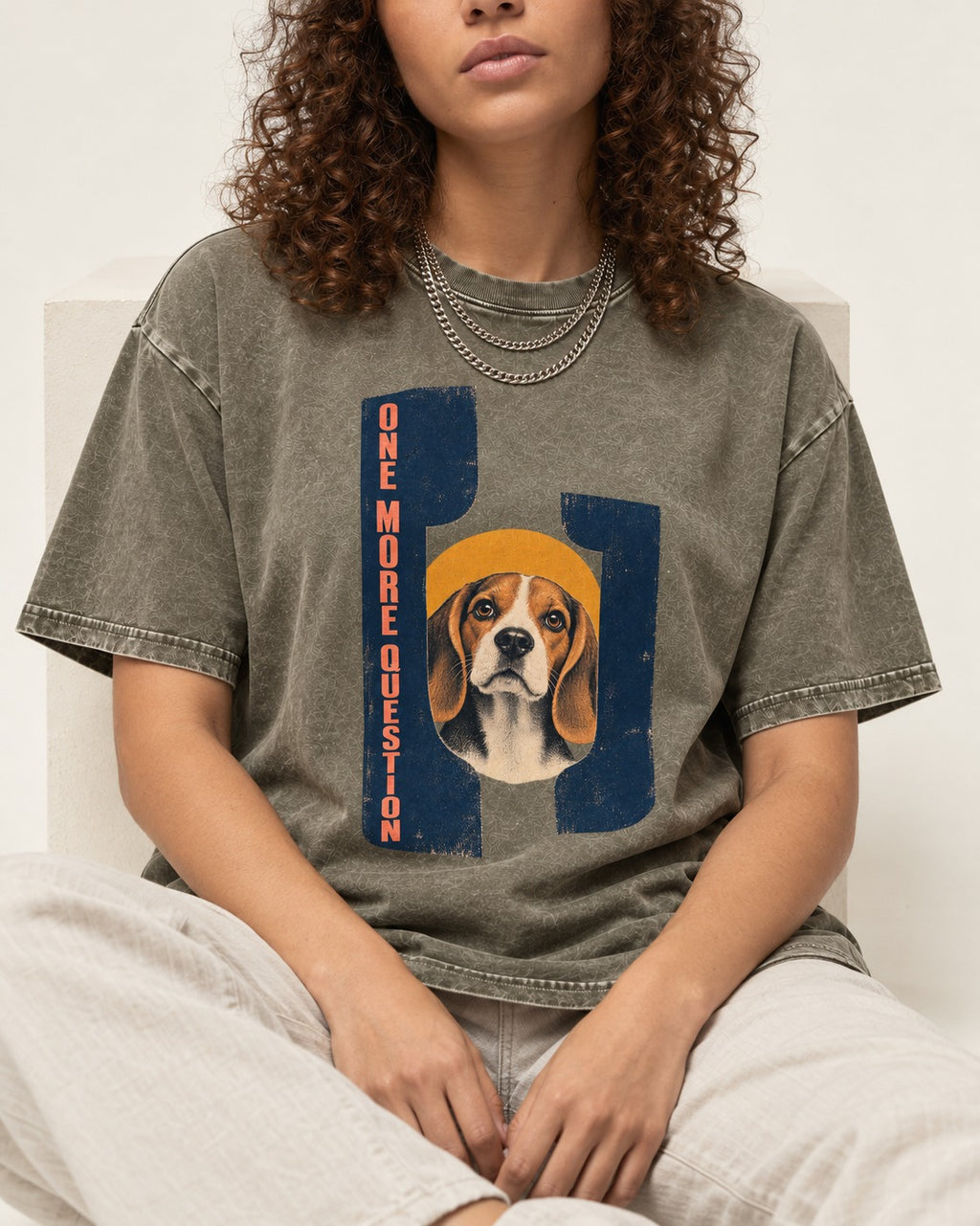One More Question Beagle Modernist Washed Tee in Army Green, worn by a seated model
