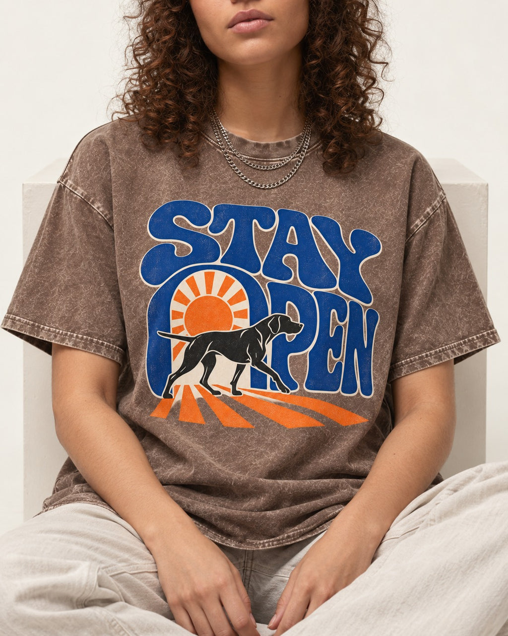 Stay Open German Shorthaired Pointer Washed Tee in Coffee, worn by a seated model