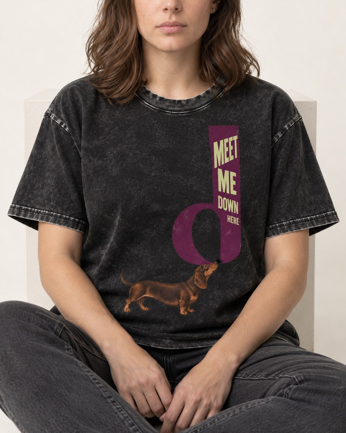 Dachshund Meet Me Down Here Letterform Loop Graphic Washed Tee in Black, worn by a seated model