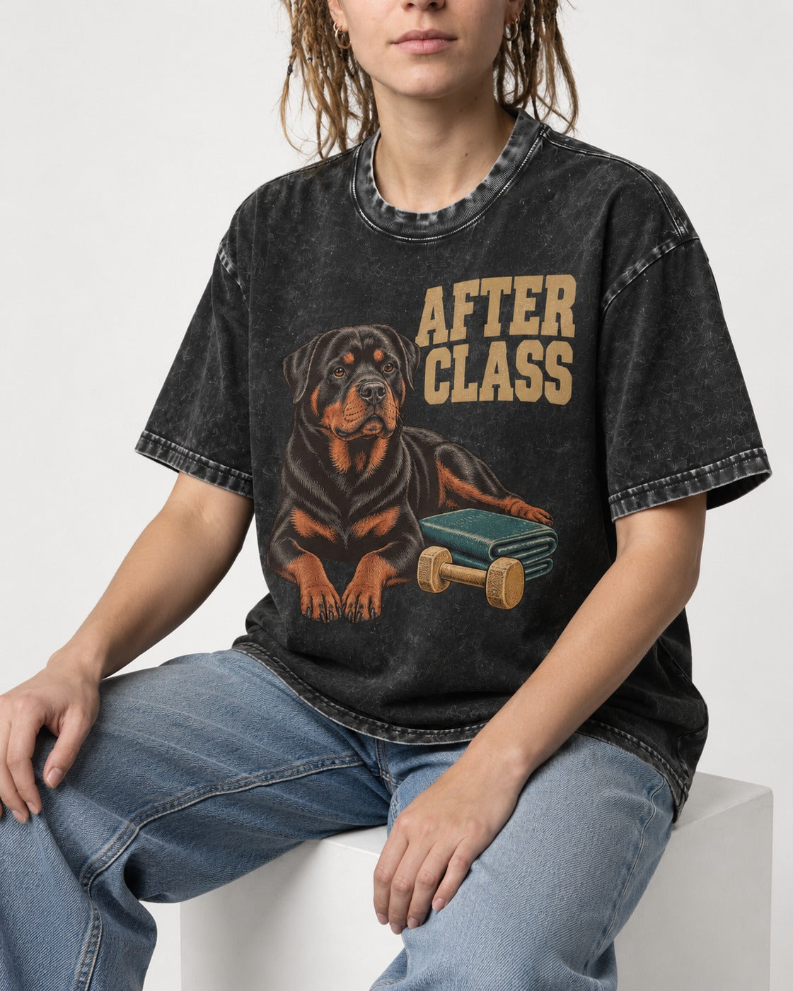 Rottweiler After Class Books and Dumbbell Graphic Washed Tee in Black, worn by a seated model