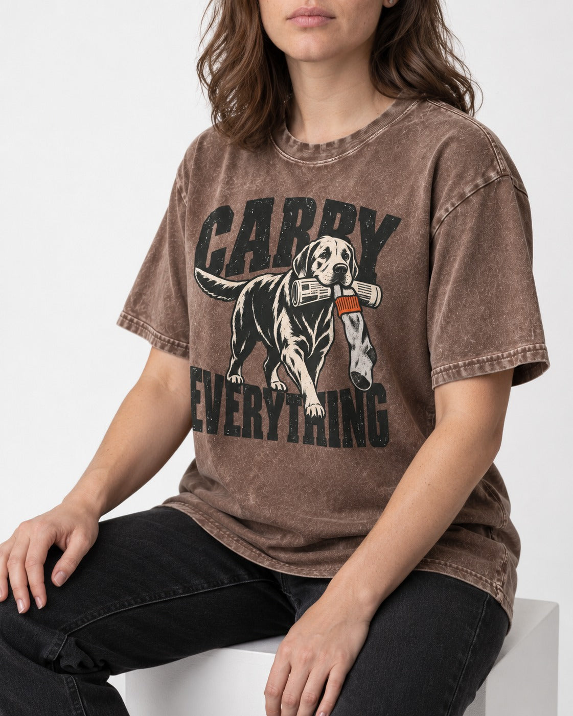 Carry Everything Labrador Retriever Washed Tee in Coffee, worn by a seated model
