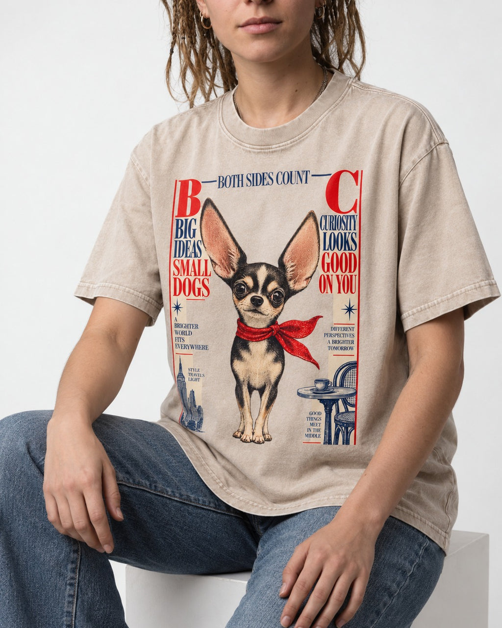 Chihuahua Big Ideas Washed Tee in Apricot, worn by a seated model