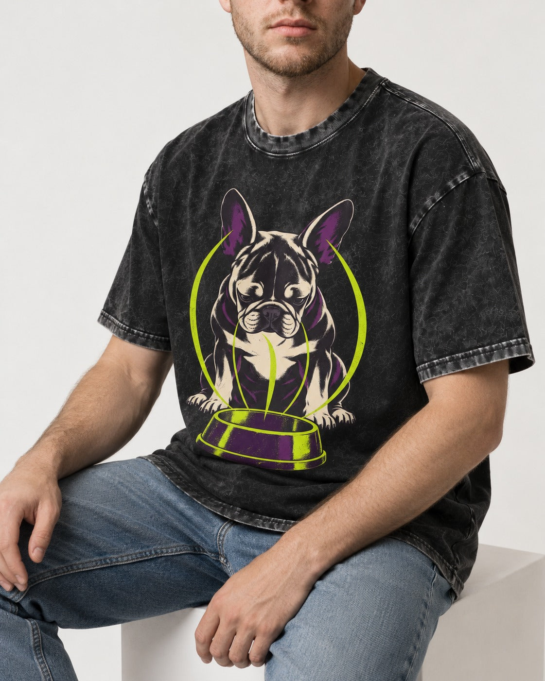 Frenchie Bowl Gravity Graphic Washed Tee in Black, worn by a seated model
