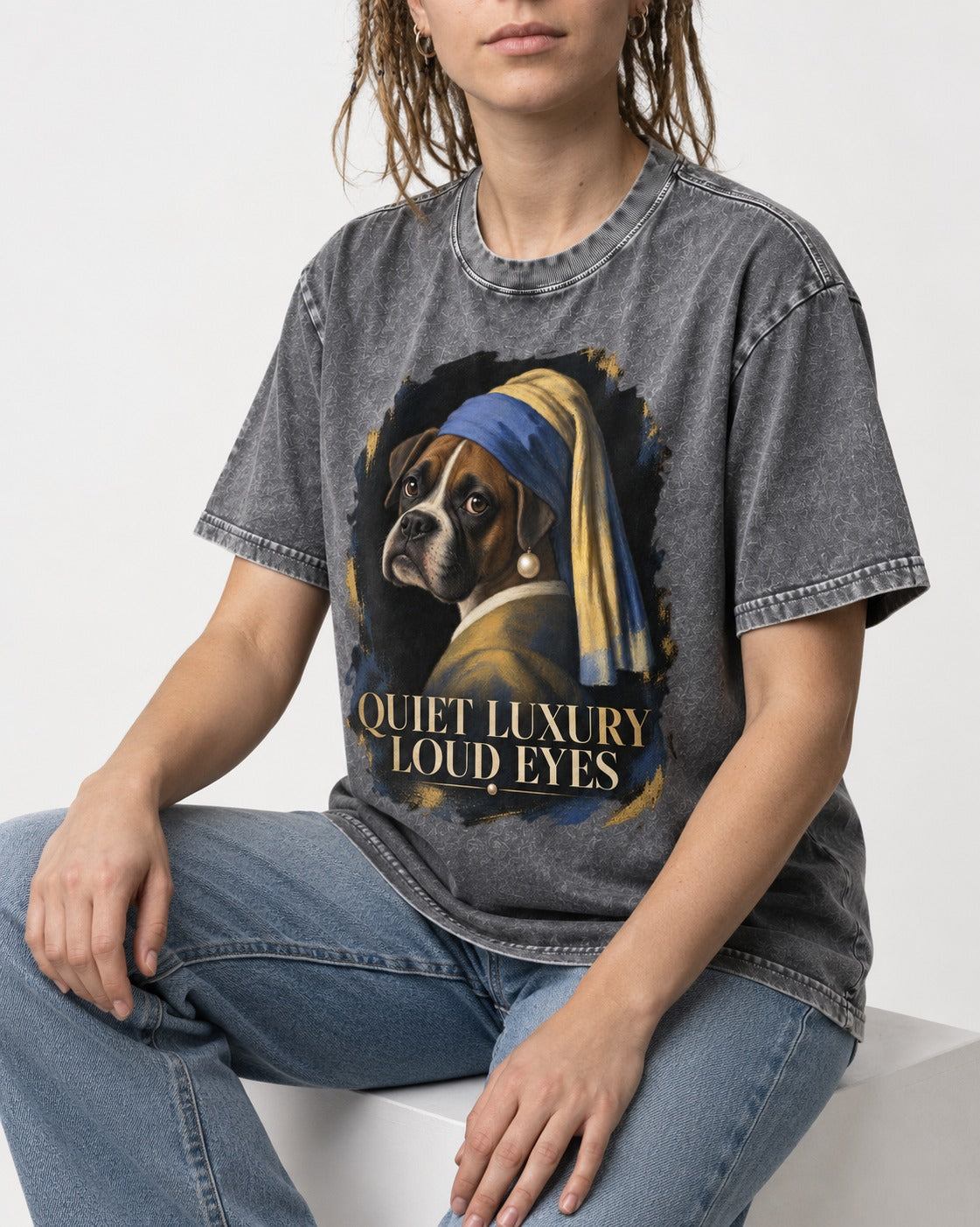 Quiet Luxury Loud Eyes Boxer Pearl Portrait Washed Tee in Gray, worn by a seated model