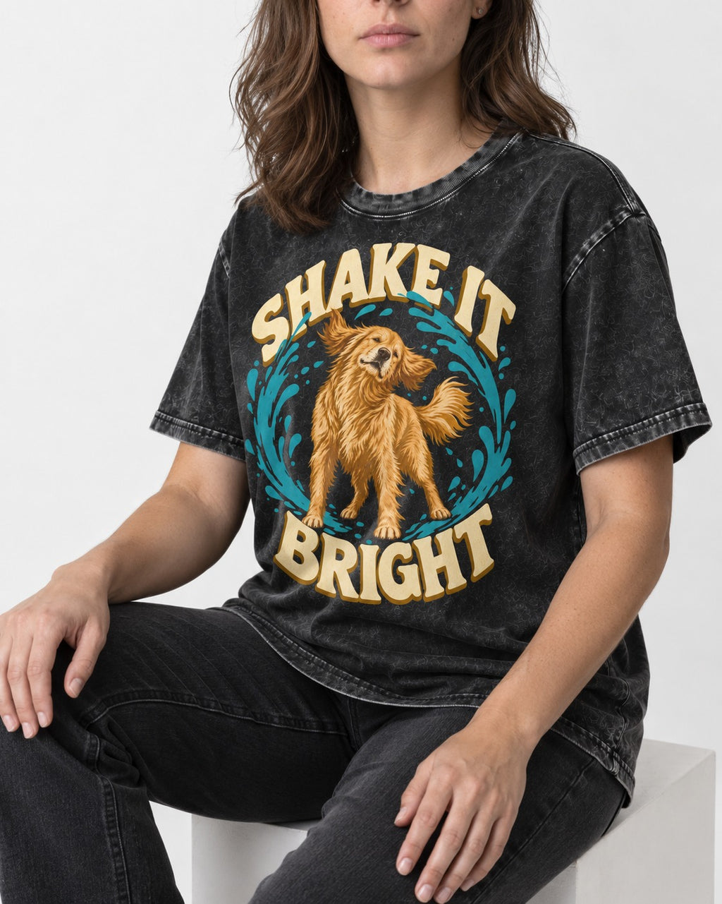 Golden Retriever Shake It Bright Water Ring Graphic Washed Tee in Black, worn by a seated model