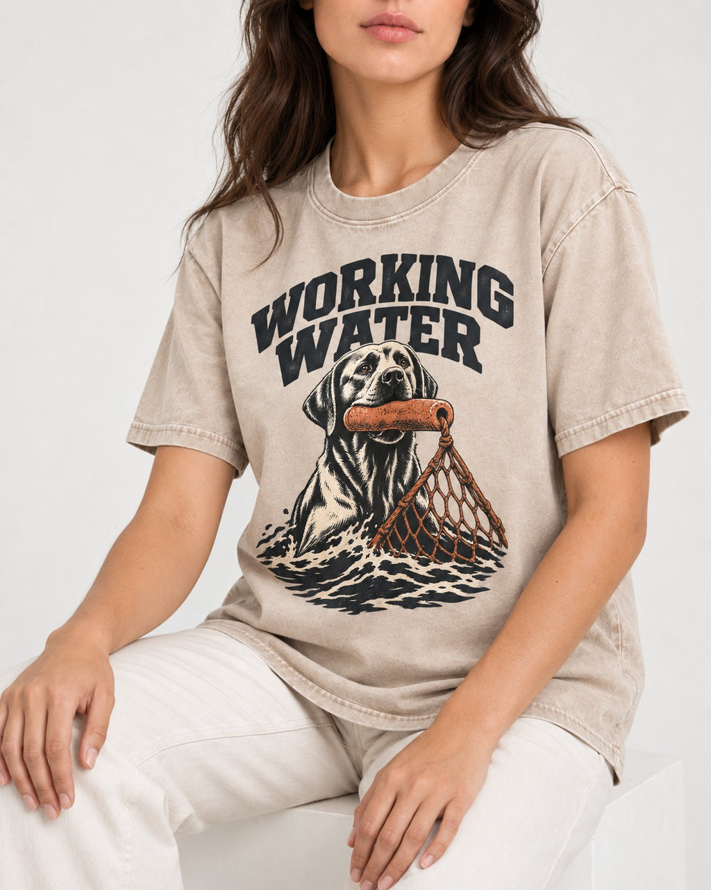 Working Water Labrador Retriever Washed Tee in Apricot, worn by a seated model