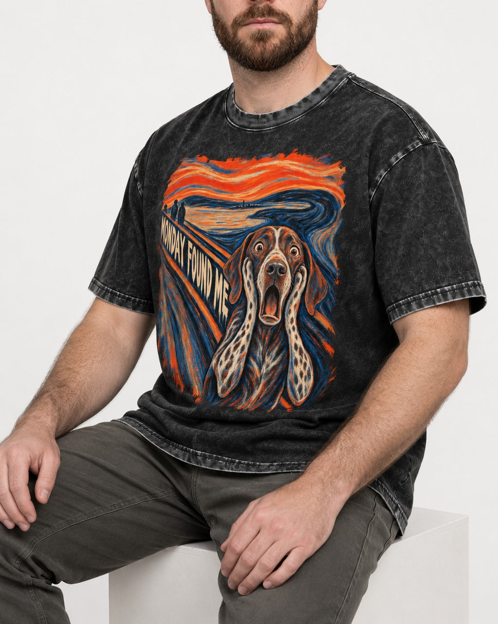German Shorthaired Pointer Monday Found Me Scream Parody Graphic Washed Tee in Black, worn by a seated model