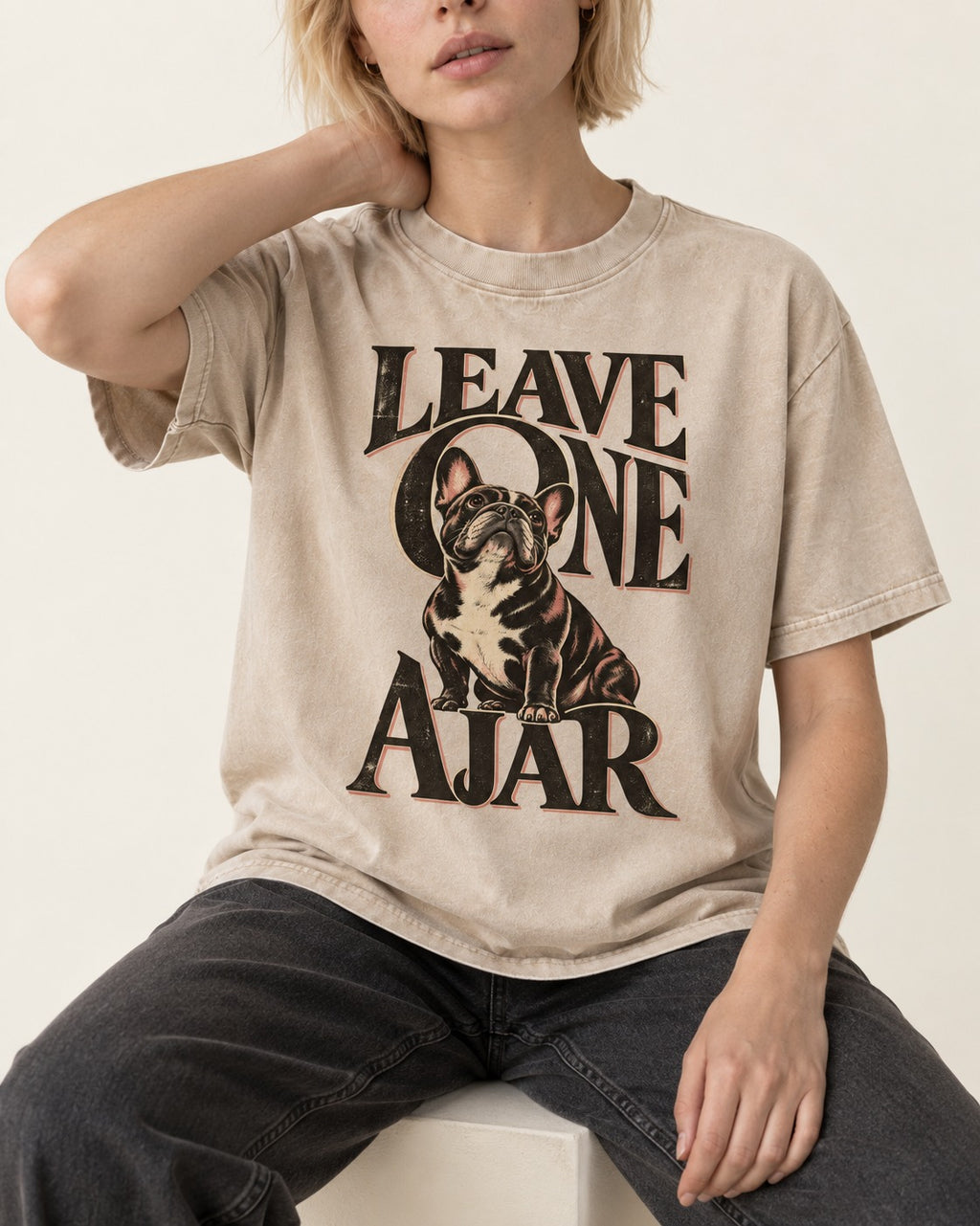 Leave One Ajar for Frenchie Washed Tee in Apricot, worn by a seated model