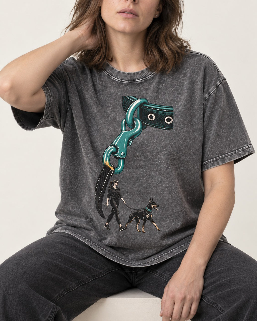 Doberman Oversized Leash Hardware Walk Graphic Washed Tee in Gray, worn by a seated model