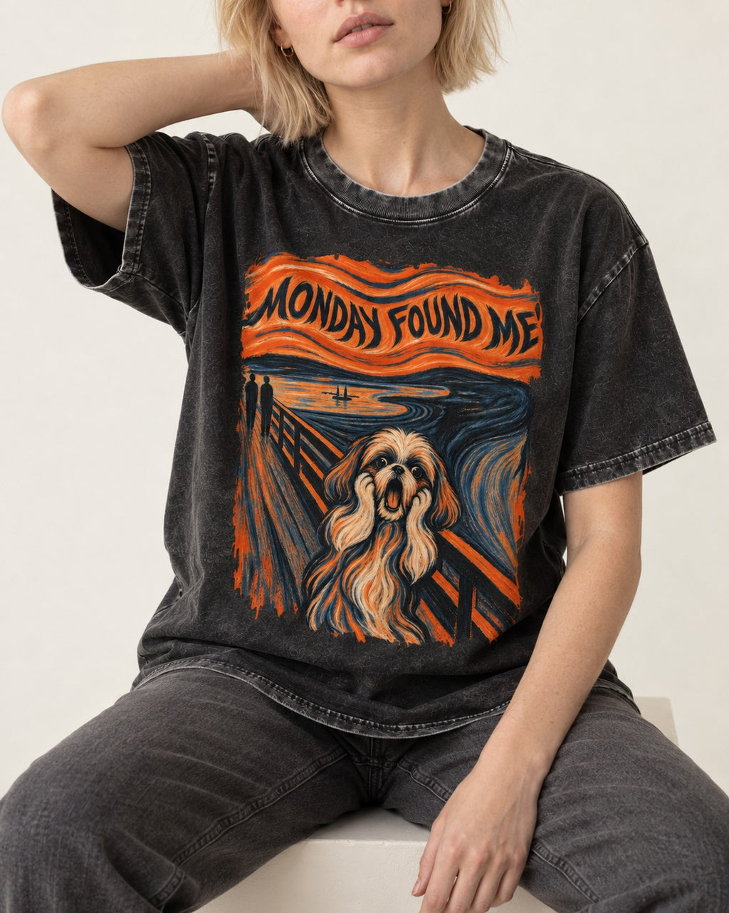 Shih Tzu Monday Found Me Scream Parody Graphic Washed Tee in Black, worn by a seated model
