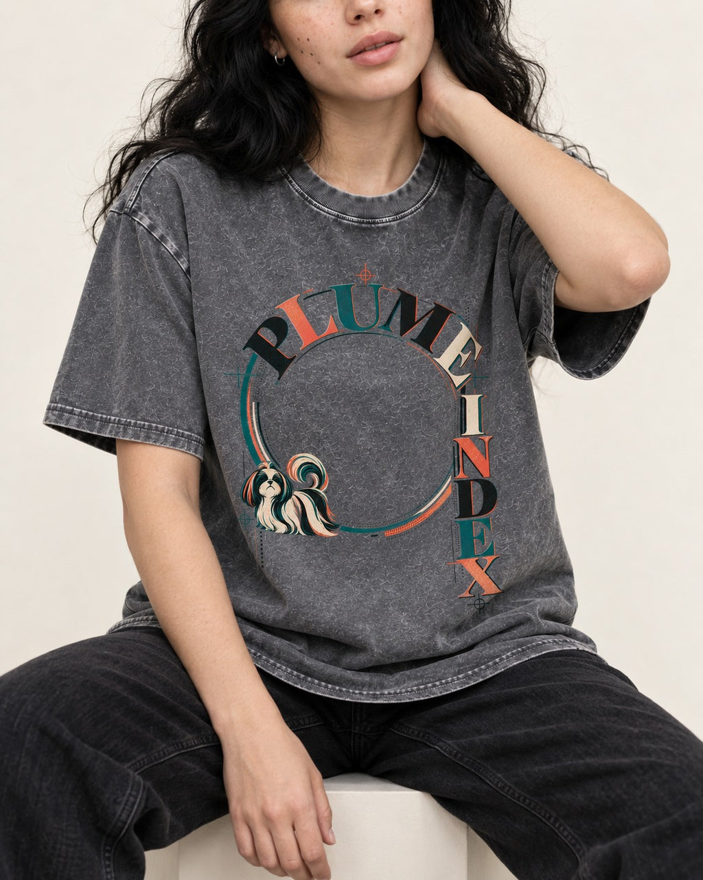 Shih Tzu Plume Index Circular Typography Graphic Washed Tee in Gray, worn by a seated model