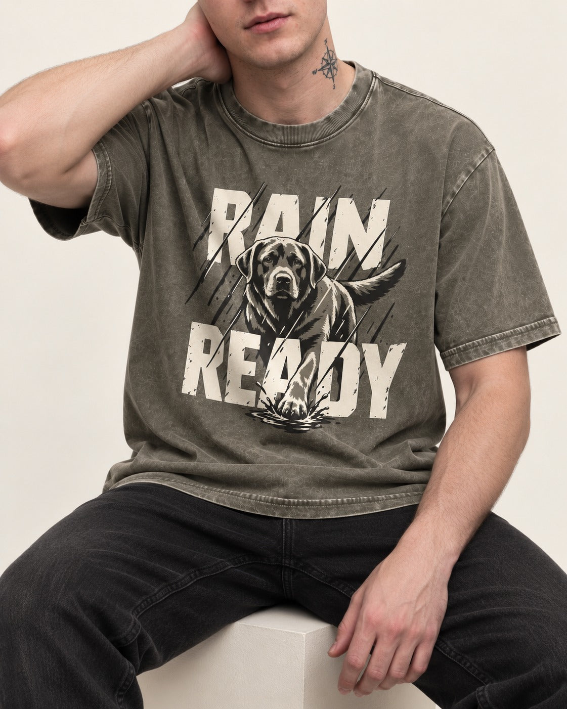 Labrador Retriever Rain Ready Charging Splash Graphic Washed Tee in Army Green, worn by a seated model