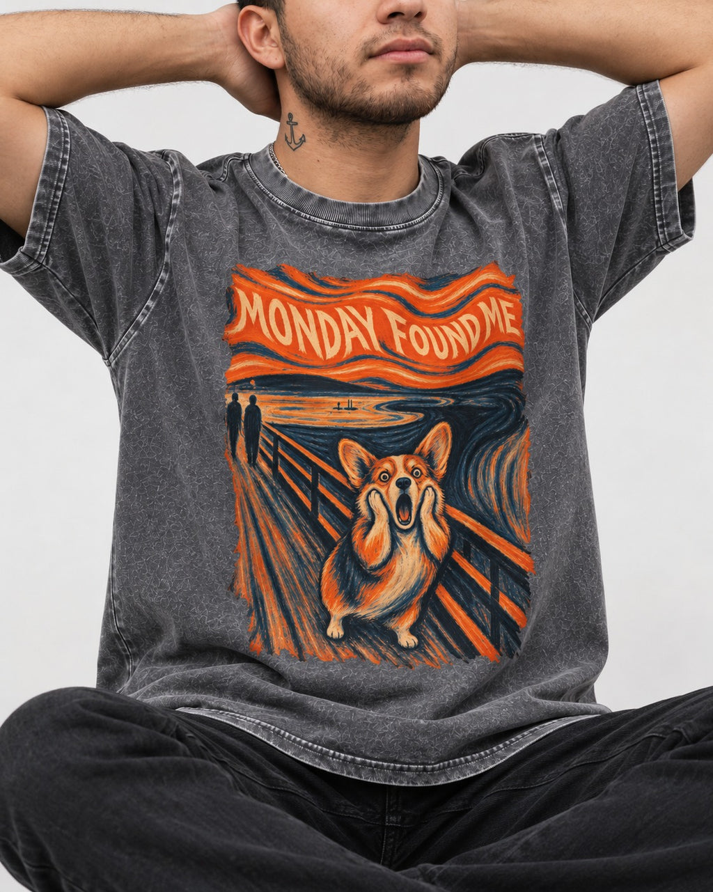 Corgi Monday Found Me Scream Banner Washed Tee in Gray, worn by a seated model