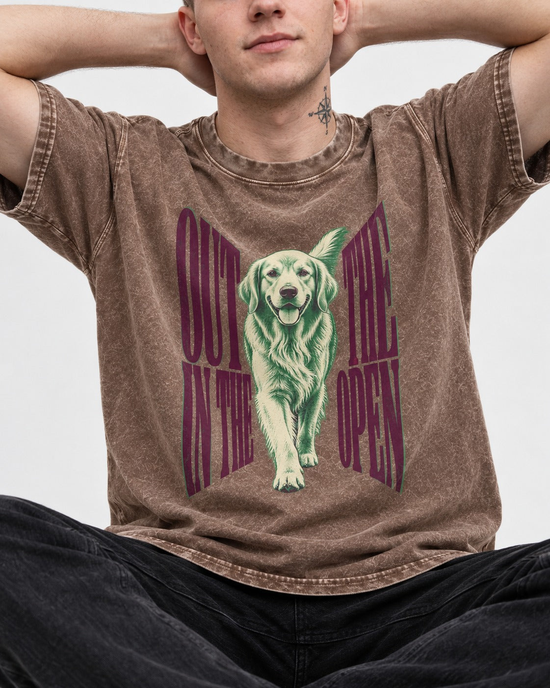 Golden Retriever Out in the Open Washed Tee in Coffee, worn by a seated model