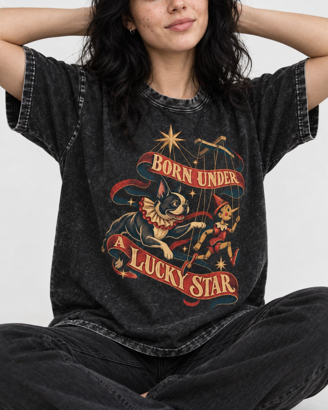 Born Under a Lucky Star Boston Terrier Washed Tee in Black, worn by a seated model