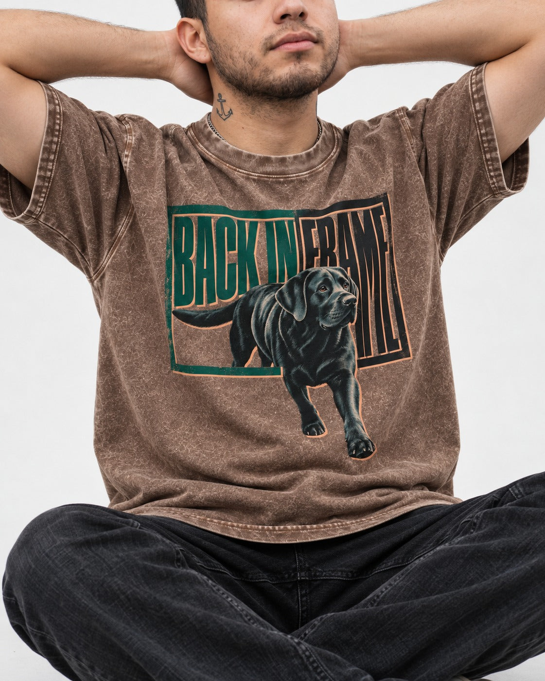 Labrador Retriever Back in Frame Washed Tee in Coffee, worn by a seated model