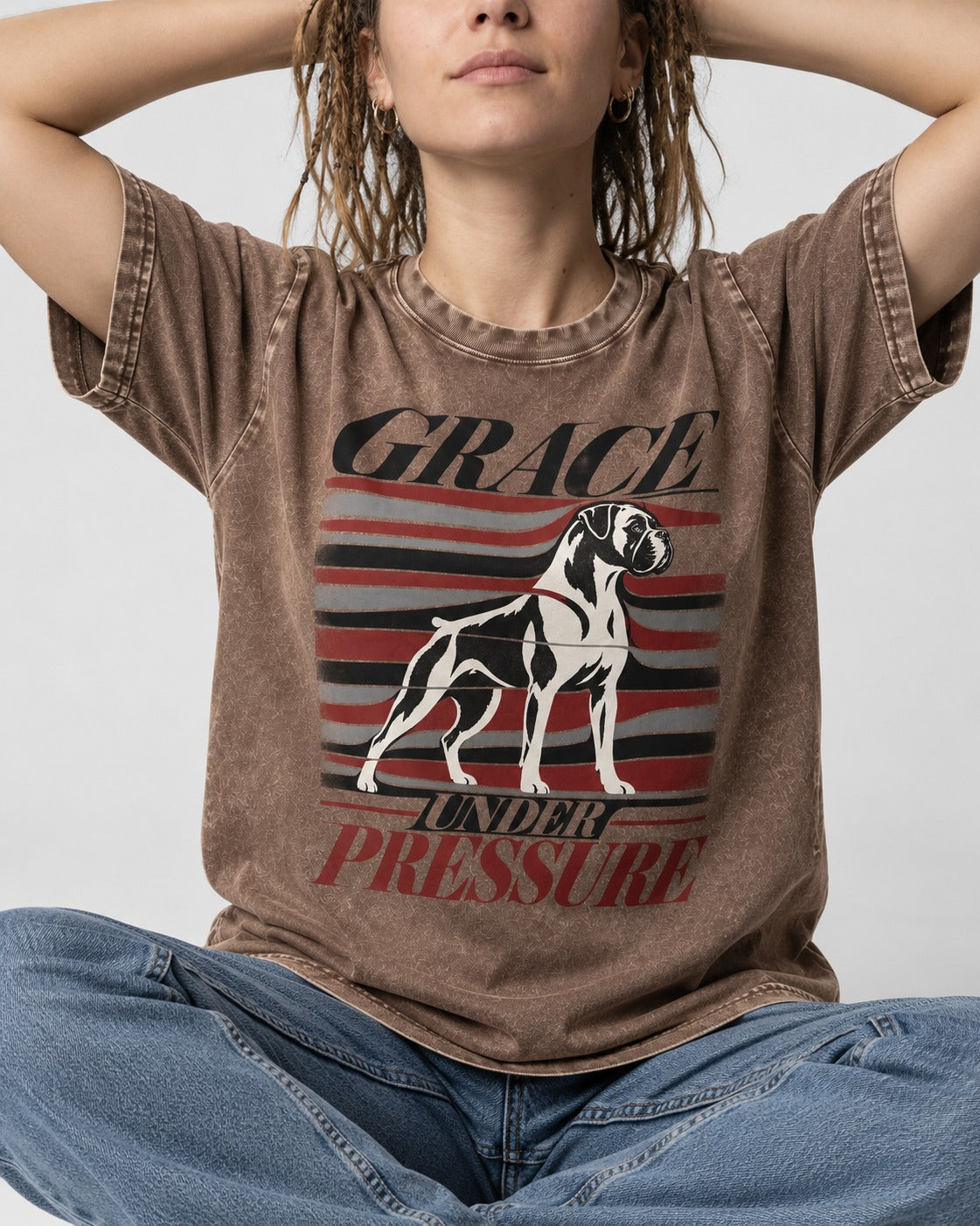 Boxer Grace Under Pressure Washed Tee in Coffee, worn by a seated model