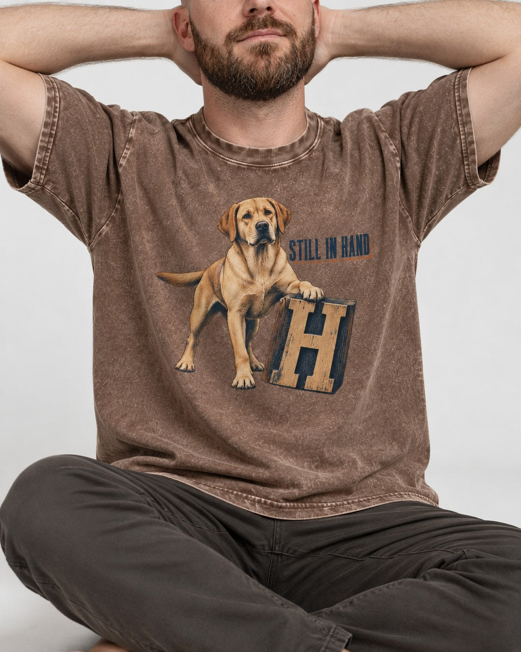 Labrador Retriever Still in Hand Washed Tee in Coffee, worn by a seated model