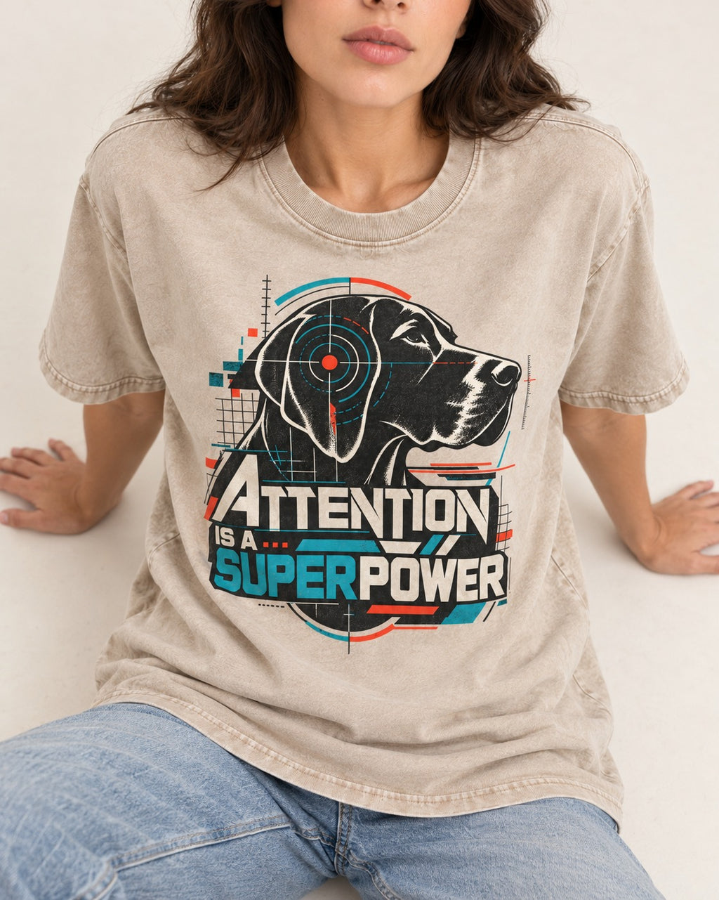 German Shorthaired Pointer Attention Is a Superpower Washed Tee in Apricot, worn by a seated model