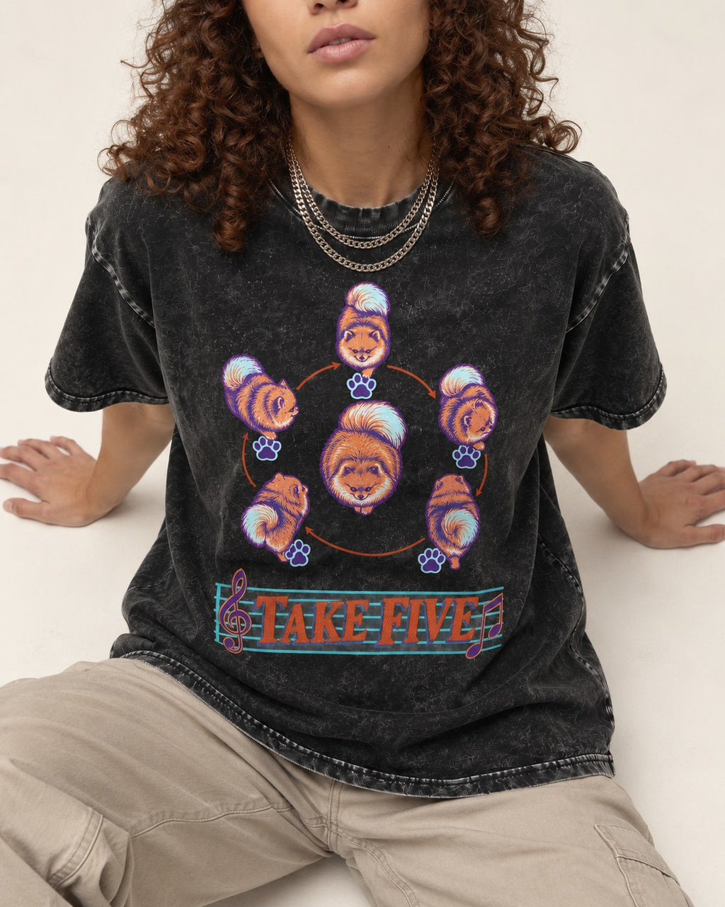 Pomeranian Take Five Choreography Cycle Graphic Washed Tee in Black, worn by a seated model