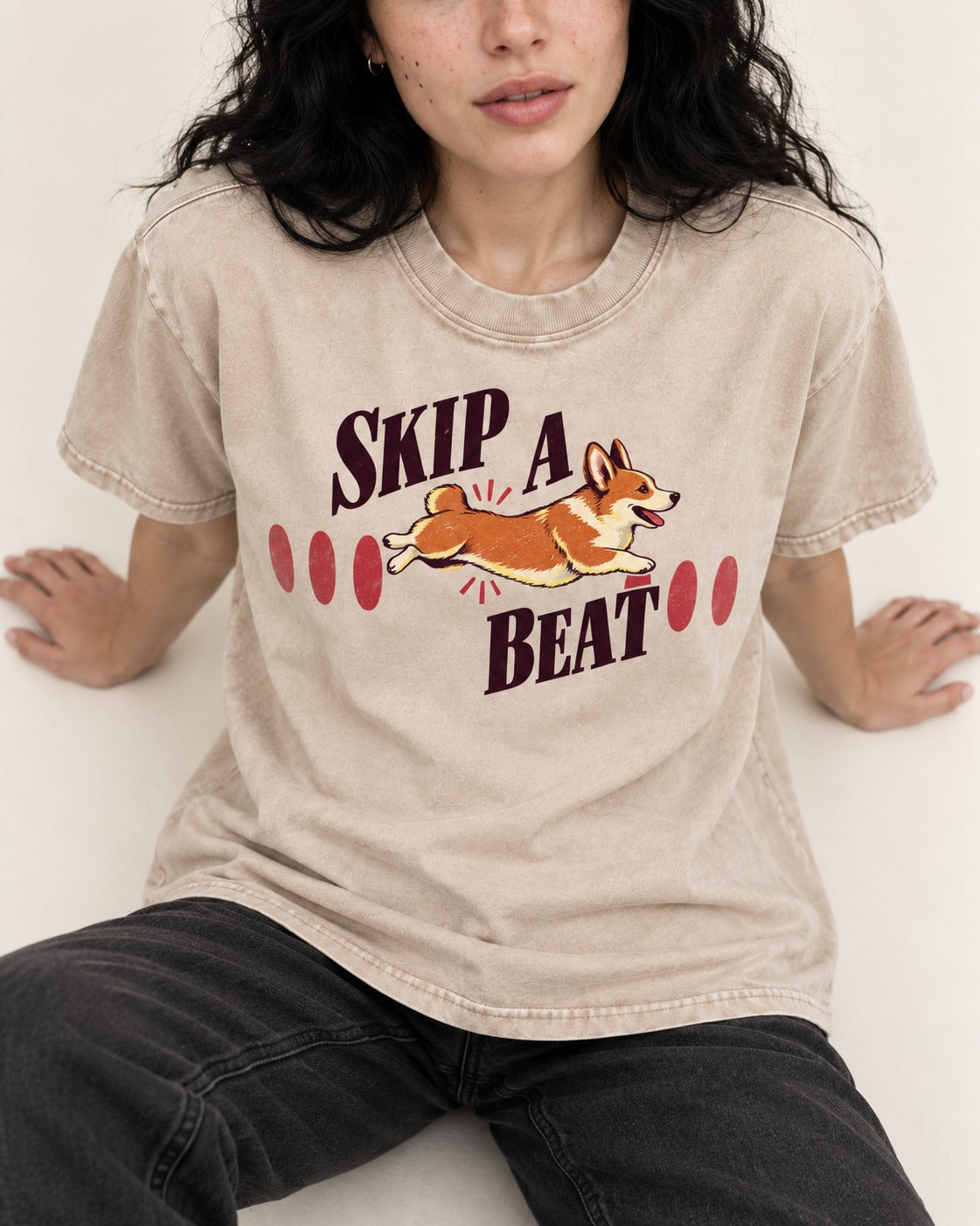 Skip a Beat Corgi Washed Tee in Apricot, worn by a seated model