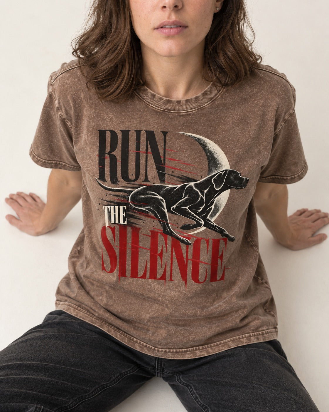 Run the Silence German Shorthaired Pointer Washed Tee in Coffee, worn by a seated model