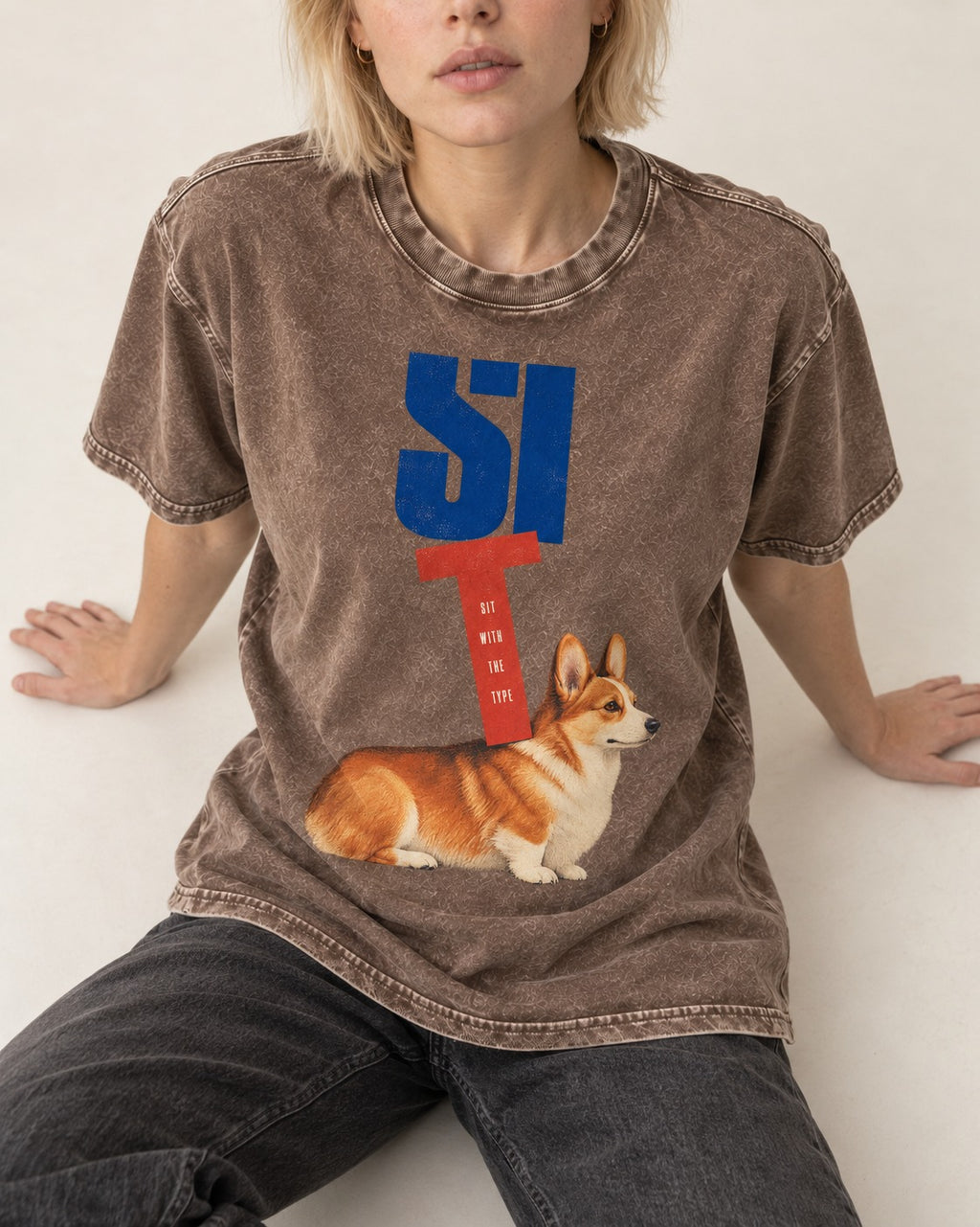 Sit with the Corgi Washed Tee in Coffee, worn by a seated model