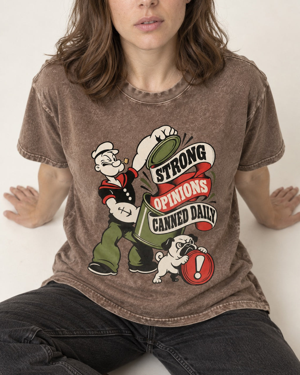 Pug Strong Opinions Washed Tee in Coffee, worn by a seated model