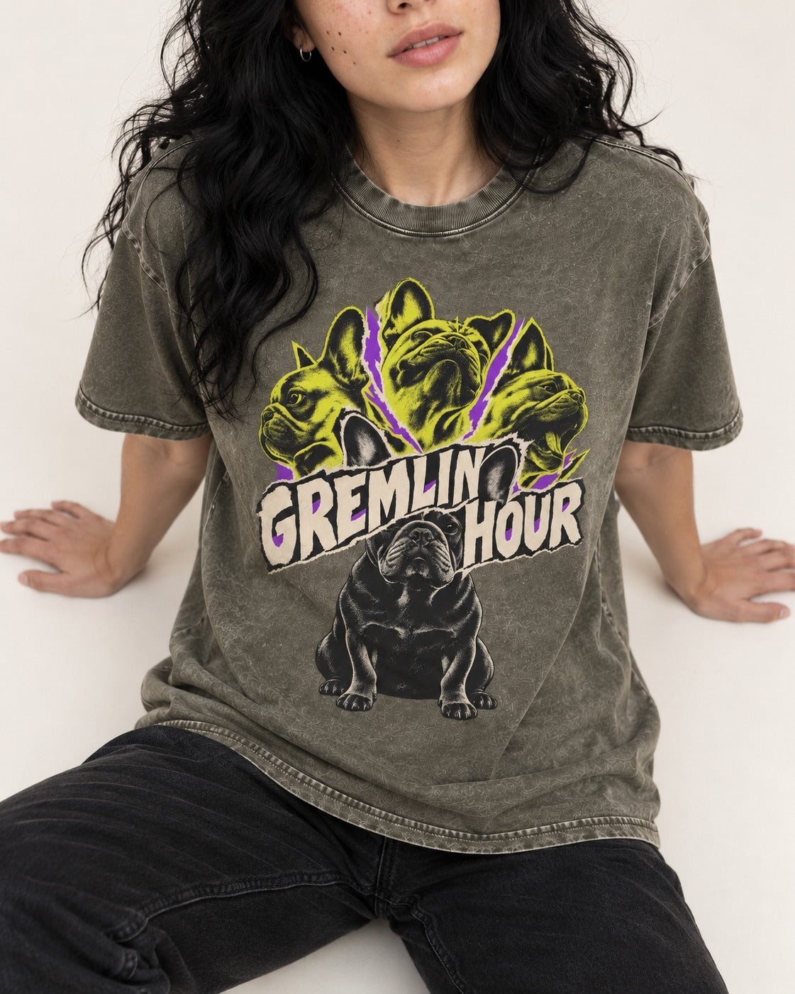 Frenchie Gremlin Hour Multi Portrait Graphic Washed Tee in Army Green, worn by a seated model