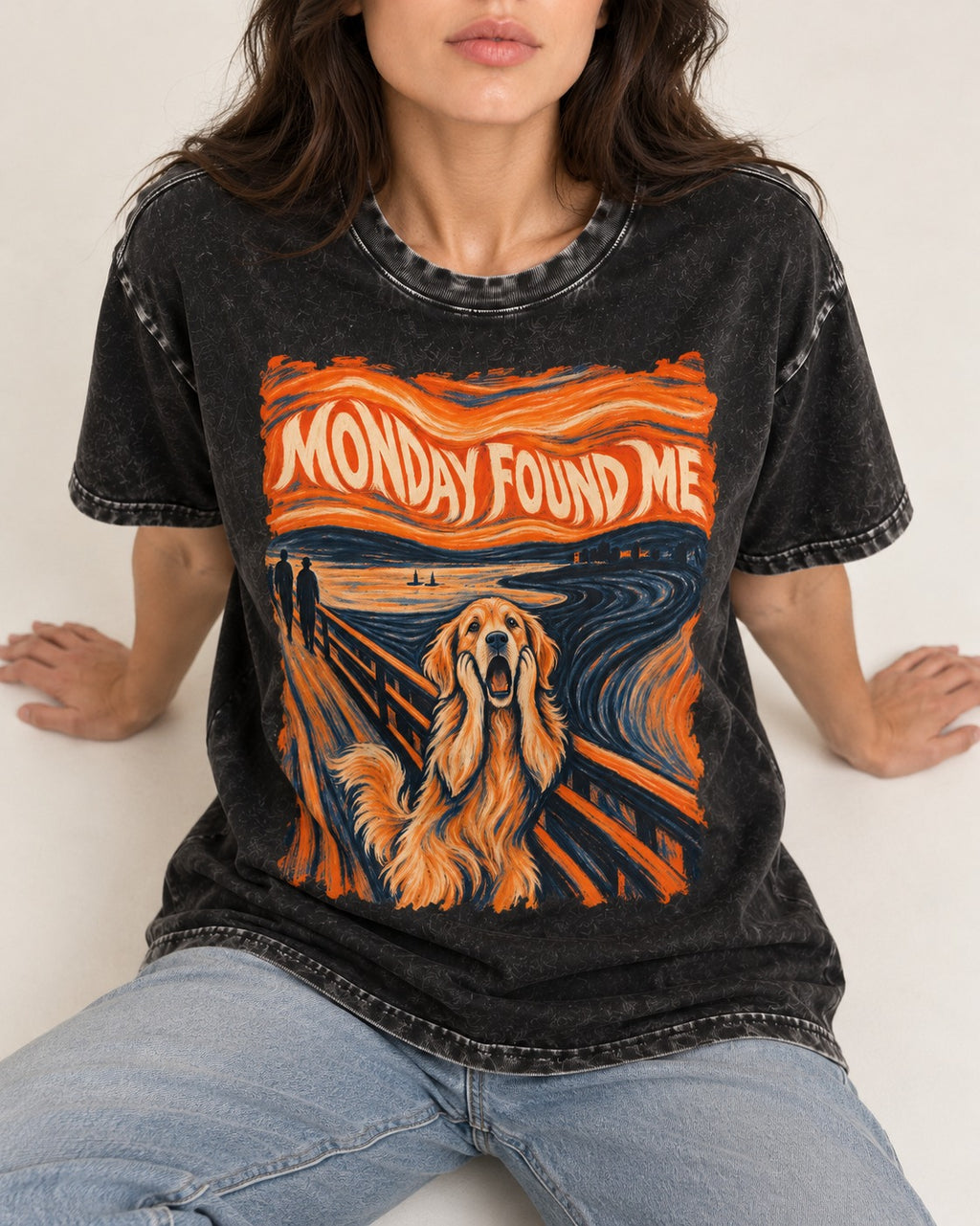 Monday Found Me Scream Golden Retriever Graphic Washed Tee in Black, worn by a seated model