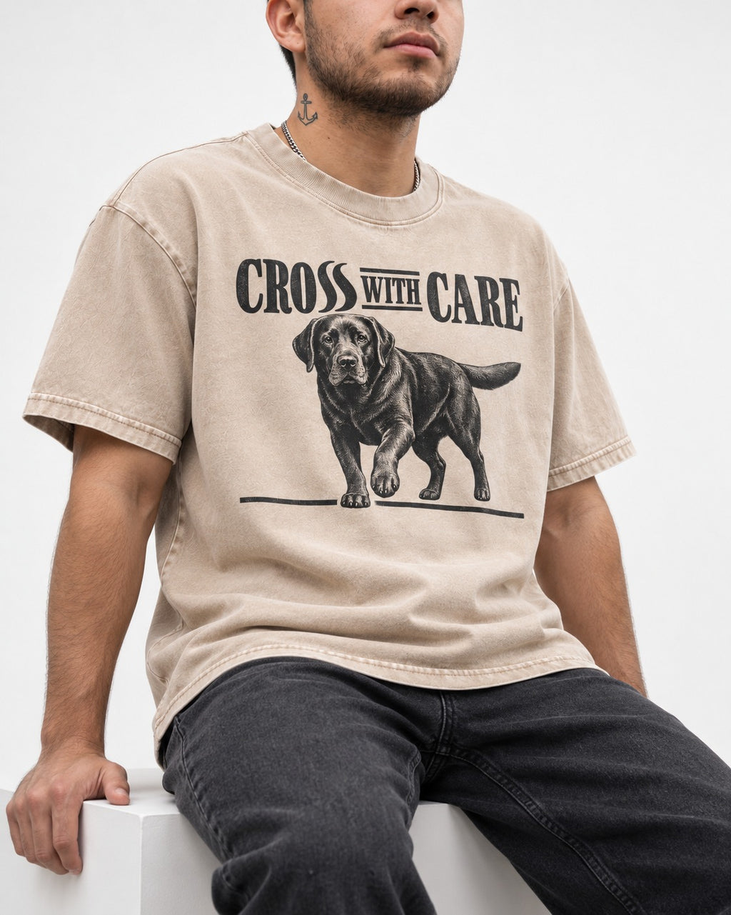 Labrador Retriever Cross with Care Washed Tee in Apricot, worn by a seated model